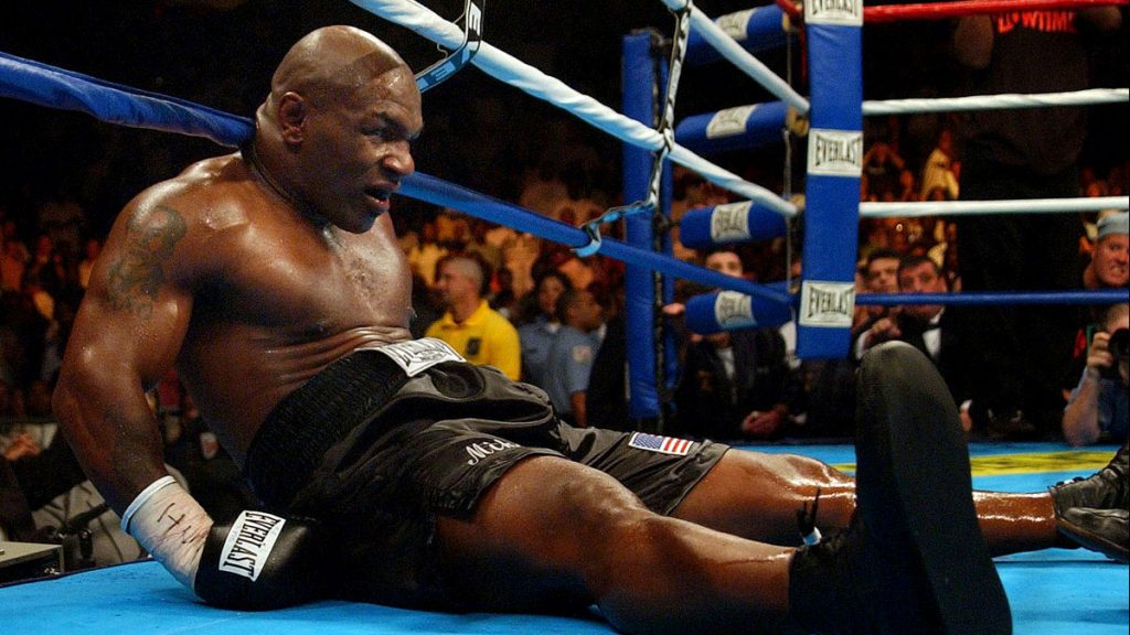 “Dunzo” The iconic ‘Iron’ Mike Tyson sits on the canvas at the end of the 6th round in his last professional fight with Kevin McBride. Tyson did not come out for the next round.