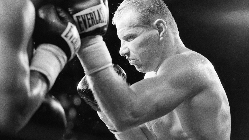 ‘Irish’ Micky Ward throws an uppercut to the face of Emanuel Augustus in their epic battle that earned them fight of the year. Ward threw a record 1182 punches during this one fight.